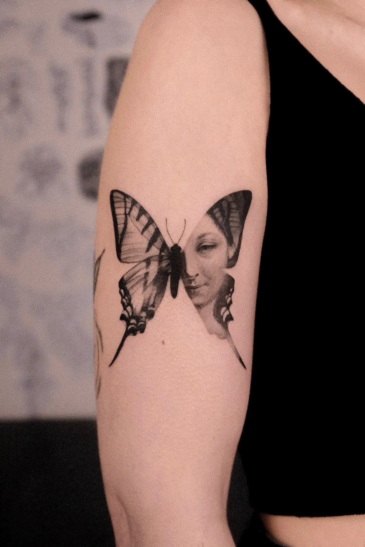 Butterfly and classical portrait tattoo