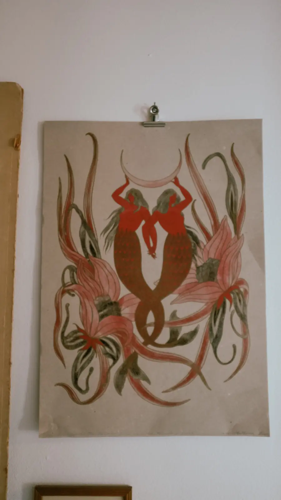 Botanical mermaid artwork inside the studio